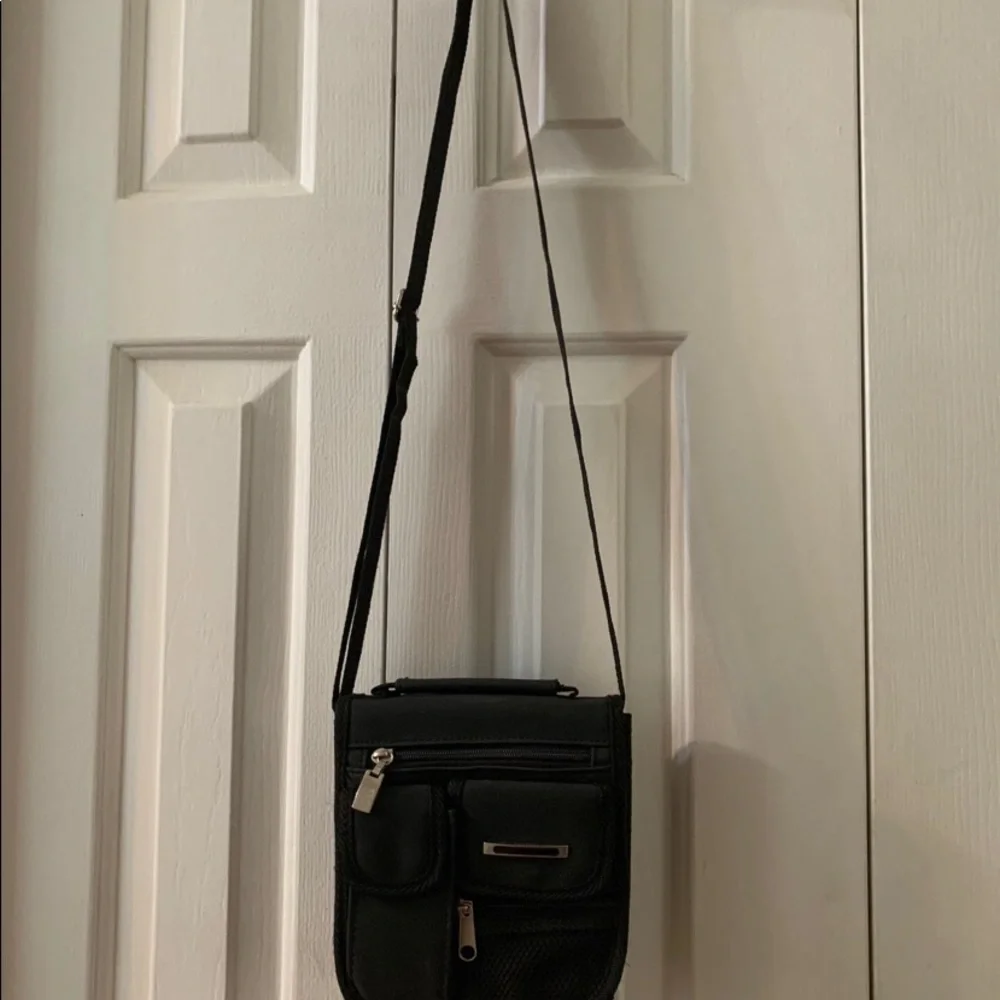 Black Crossbody Handbag. Silver Hardware